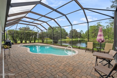 Coventry Model with a 2024 ROOF, resurfaced POOL in 2023 & NEWER on Plantation Bay Golf and Country Club in Florida - for sale on GolfHomes.com, golf home, golf lot