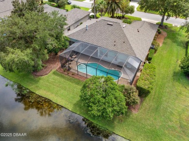 Coventry Model with a 2024 ROOF, resurfaced POOL in 2023 & NEWER on Plantation Bay Golf and Country Club in Florida - for sale on GolfHomes.com, golf home, golf lot