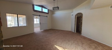 Discover this lovely 2-bedroom (possible 3 bedroom), 2-bathroom on Tierra Del Sol Golf Course in New Mexico - for sale on GolfHomes.com, golf home, golf lot