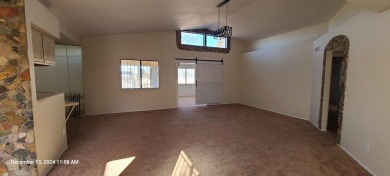 Discover this lovely 2-bedroom (possible 3 bedroom), 2-bathroom on Tierra Del Sol Golf Course in New Mexico - for sale on GolfHomes.com, golf home, golf lot