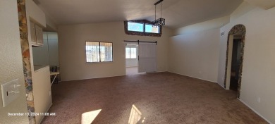 Discover this lovely 2-bedroom (possible 3 bedroom), 2-bathroom on Tierra Del Sol Golf Course in New Mexico - for sale on GolfHomes.com, golf home, golf lot