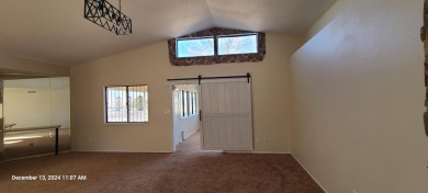 Discover this lovely 2-bedroom (possible 3 bedroom), 2-bathroom on Tierra Del Sol Golf Course in New Mexico - for sale on GolfHomes.com, golf home, golf lot