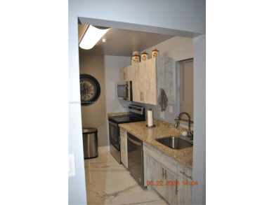 Beautifully remodeled villa in the heart of Kendall. Walking on Miccosukee Golf and Country Club in Florida - for sale on GolfHomes.com, golf home, golf lot