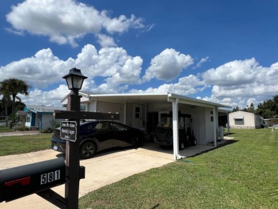 This well maintained and beautifully furnished home, in active on Lake Henry Golf Club in Florida - for sale on GolfHomes.com, golf home, golf lot