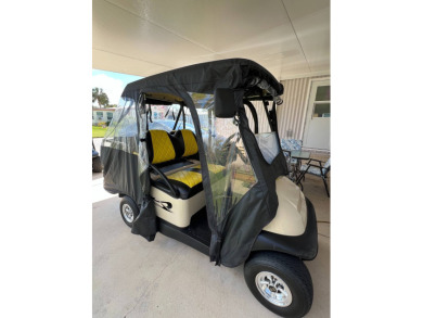 This well maintained and beautifully furnished home, in active on Lake Henry Golf Club in Florida - for sale on GolfHomes.com, golf home, golf lot