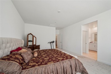 Experience the charm of Spanish-style architecture in this on El Rancho Verde Golf Club in California - for sale on GolfHomes.com, golf home, golf lot