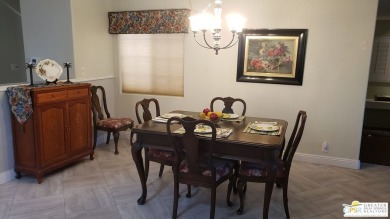 This delightful turnkey furnished 2bed, 3bath 1600+ sq ft home on Date Palm Country Club in California - for sale on GolfHomes.com, golf home, golf lot