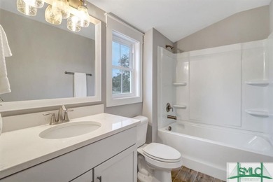 Welcome to this exquisite former model home, a stunning showcase on Savannah Quarters Country Club in Georgia - for sale on GolfHomes.com, golf home, golf lot