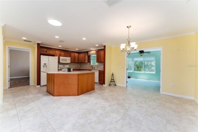 Welcome to this well-maintained AMARILLO MODEL located in the on The Links of Spruce Creek in Florida - for sale on GolfHomes.com, golf home, golf lot