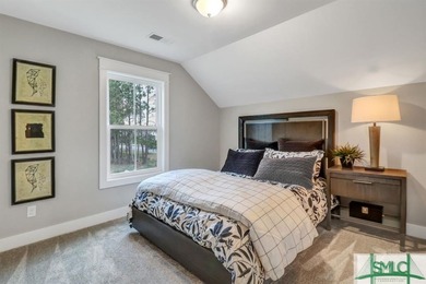 Welcome to this exquisite former model home, a stunning showcase on Savannah Quarters Country Club in Georgia - for sale on GolfHomes.com, golf home, golf lot