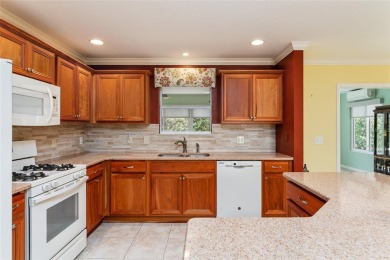 Welcome to this well-maintained AMARILLO MODEL located in the on The Links of Spruce Creek in Florida - for sale on GolfHomes.com, golf home, golf lot