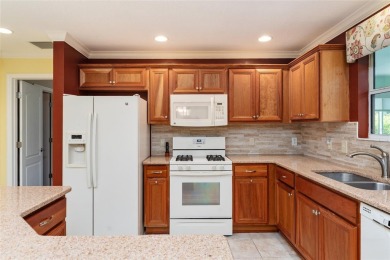 Welcome to this well-maintained AMARILLO MODEL located in the on The Links of Spruce Creek in Florida - for sale on GolfHomes.com, golf home, golf lot
