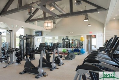 Welcome to this exquisite former model home, a stunning showcase on Savannah Quarters Country Club in Georgia - for sale on GolfHomes.com, golf home, golf lot