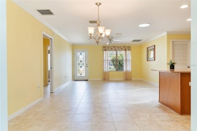 Welcome to this well-maintained AMARILLO MODEL located in the on The Links of Spruce Creek in Florida - for sale on GolfHomes.com, golf home, golf lot