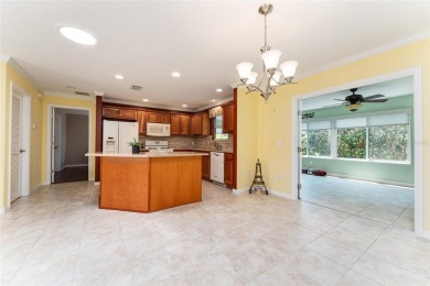Welcome to this well-maintained AMARILLO MODEL located in the on The Links of Spruce Creek in Florida - for sale on GolfHomes.com, golf home, golf lot