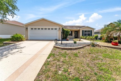 Welcome to this well-maintained AMARILLO MODEL located in the on The Links of Spruce Creek in Florida - for sale on GolfHomes.com, golf home, golf lot