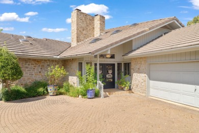 Bathed in natural light and framed by serene golf course and on Slick Rock Golf Course - Horseshoe Bay in Texas - for sale on GolfHomes.com, golf home, golf lot