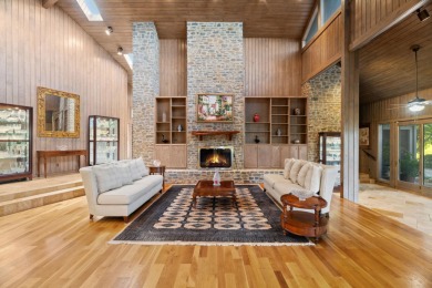 Bathed in natural light and framed by serene golf course and on Slick Rock Golf Course - Horseshoe Bay in Texas - for sale on GolfHomes.com, golf home, golf lot