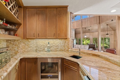 Bathed in natural light and framed by serene golf course and on Slick Rock Golf Course - Horseshoe Bay in Texas - for sale on GolfHomes.com, golf home, golf lot