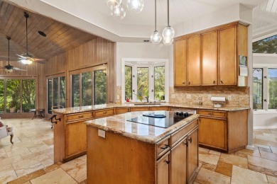 Bathed in natural light and framed by serene golf course and on Slick Rock Golf Course - Horseshoe Bay in Texas - for sale on GolfHomes.com, golf home, golf lot