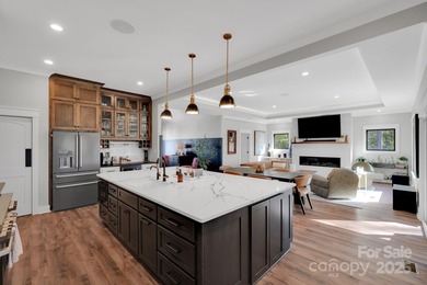 A truly exceptional, custom-built home perfectly positioned on 1 on Rock Barn Golf and Spa in North Carolina - for sale on GolfHomes.com, golf home, golf lot