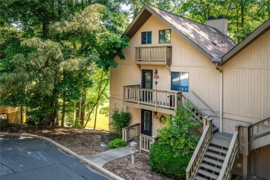 A Tuscan-style upper-level unit featuring a primary suite on the on Keowee Key Golf and Country Club in South Carolina - for sale on GolfHomes.com, golf home, golf lot