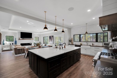 A truly exceptional, custom-built home perfectly positioned on 1 on Rock Barn Golf and Spa in North Carolina - for sale on GolfHomes.com, golf home, golf lot