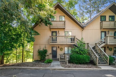 A Tuscan-style upper-level unit featuring a primary suite on the on Keowee Key Golf and Country Club in South Carolina - for sale on GolfHomes.com, golf home, golf lot