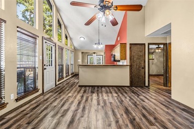 Welcome home to a warm and inviting retreat tucked away among on Holly Lake Ranch Golf Club in Texas - for sale on GolfHomes.com, golf home, golf lot