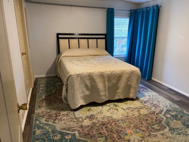 Lovely 2/2 in vibrant 55+ lease hold ($844) community. Wall of on Spanish Lakes Fairways in Florida - for sale on GolfHomes.com, golf home, golf lot