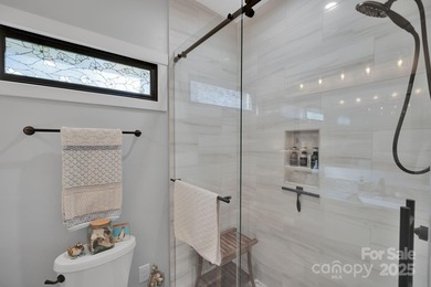 A truly exceptional, custom-built home perfectly positioned on 1 on Rock Barn Golf and Spa in North Carolina - for sale on GolfHomes.com, golf home, golf lot