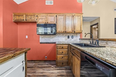 Welcome home to a warm and inviting retreat tucked away among on Holly Lake Ranch Golf Club in Texas - for sale on GolfHomes.com, golf home, golf lot