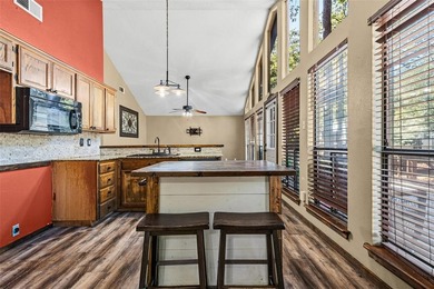 Welcome home to a warm and inviting retreat tucked away among on Holly Lake Ranch Golf Club in Texas - for sale on GolfHomes.com, golf home, golf lot