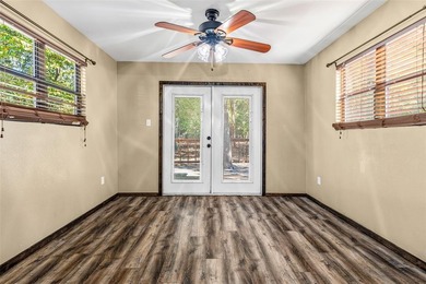 Welcome home to a warm and inviting retreat tucked away among on Holly Lake Ranch Golf Club in Texas - for sale on GolfHomes.com, golf home, golf lot