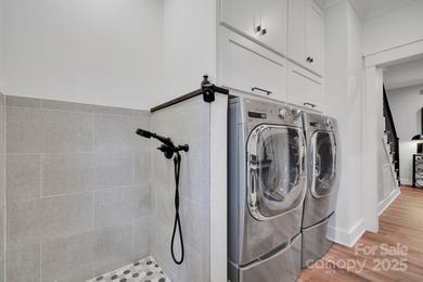 A truly exceptional, custom-built home perfectly positioned on 1 on Rock Barn Golf and Spa in North Carolina - for sale on GolfHomes.com, golf home, golf lot