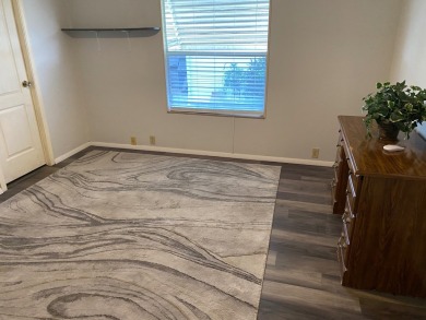 Lovely 2/2 in vibrant 55+ lease hold ($844) community. Wall of on Spanish Lakes Fairways in Florida - for sale on GolfHomes.com, golf home, golf lot
