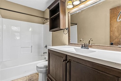 Welcome home to a warm and inviting retreat tucked away among on Holly Lake Ranch Golf Club in Texas - for sale on GolfHomes.com, golf home, golf lot