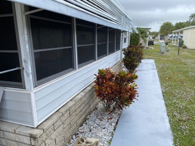 Lovely 2/2 in vibrant 55+ lease hold ($844) community. Wall of on Spanish Lakes Fairways in Florida - for sale on GolfHomes.com, golf home, golf lot