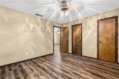 Welcome home to a warm and inviting retreat tucked away among on Holly Lake Ranch Golf Club in Texas - for sale on GolfHomes.com, golf home, golf lot