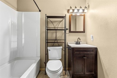 Welcome home to a warm and inviting retreat tucked away among on Holly Lake Ranch Golf Club in Texas - for sale on GolfHomes.com, golf home, golf lot