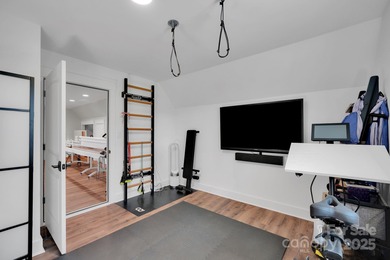 A truly exceptional, custom-built home perfectly positioned on 1 on Rock Barn Golf and Spa in North Carolina - for sale on GolfHomes.com, golf home, golf lot