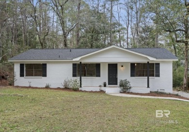 Enjoy living in convenient Lake Forest in this updated one-story on Lake Forest Yacht and Country Club in Alabama - for sale on GolfHomes.com, golf home, golf lot