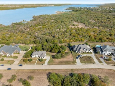 Discover the beauty of Joe Pool Lake with this one-of-a-kind lot on Tangle Ridge Golf Club in Texas - for sale on GolfHomes.com, golf home, golf lot