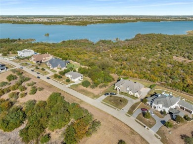 Discover the beauty of Joe Pool Lake with this one-of-a-kind lot on Tangle Ridge Golf Club in Texas - for sale on GolfHomes.com, golf home, golf lot