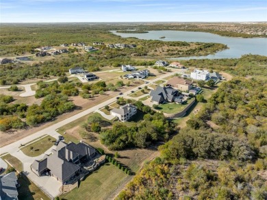 Discover the beauty of Joe Pool Lake with this one-of-a-kind lot on Tangle Ridge Golf Club in Texas - for sale on GolfHomes.com, golf home, golf lot