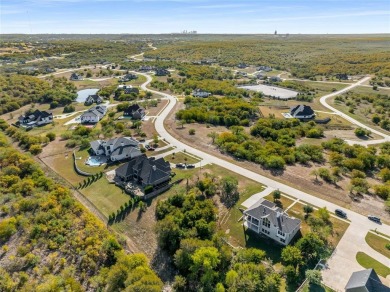 Discover the beauty of Joe Pool Lake with this one-of-a-kind lot on Tangle Ridge Golf Club in Texas - for sale on GolfHomes.com, golf home, golf lot