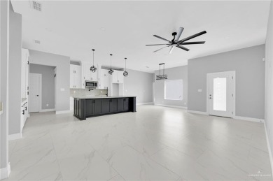 Step into modern comfort with this beautifully designed on Los Lagos Golf Club in Texas - for sale on GolfHomes.com, golf home, golf lot