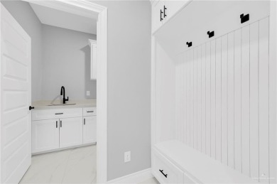 Step into modern comfort with this beautifully designed on Los Lagos Golf Club in Texas - for sale on GolfHomes.com, golf home, golf lot