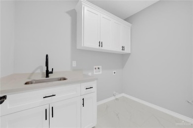 Step into modern comfort with this beautifully designed on Los Lagos Golf Club in Texas - for sale on GolfHomes.com, golf home, golf lot