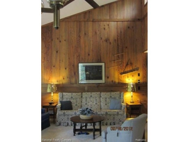 Welcome to 4010 Owl. This custom built Mahalak contemporary on Lost Lake Woods Club in Michigan - for sale on GolfHomes.com, golf home, golf lot